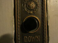 1920s Otis hall station button.