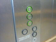 D8 COP buttons on a Schindler 2600 MRL.