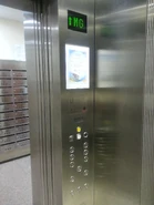 Tonic DM032H-x-SD LED dot-matrix floor indicator on the Schindler elevator.