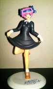 Nana's PVC figure only has one interchangeable part (her hair), and unlike the Lucy figure, Nana cannot be removed from her stand, as she would fall over.