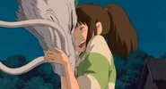 SpiritedAway9.jpg (36 kB) Chihiro junto a Haku como Dragón.