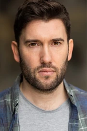 Headshot taken by Rocco Redondo.