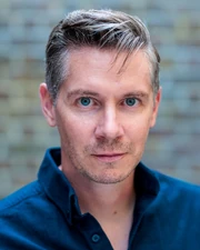 Headshot taken by Amy Davies Photography.