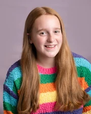 Headshot taken by Louise Gallagher Photography.