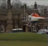 A helicopter with business clients in lands at Home Farm in 1988.