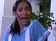 Chapter 33; Agane is about to strike Mila with her chain.