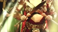 The warrior armor of Pirena’s descendant is like her Etheria warrior armor, but it has some differences, as shown in the show’s teaser. The differences sighted in the 15 seconds long teaser are: there is more cloth covering the stomach part, there are three gauntlets on both arms and she wears a long red cape.