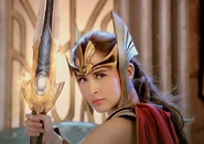 Mine-a in her Warrior attire holding the Laya