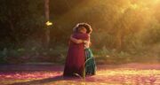 Alma and Mirabel hug