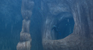 The diver entering Great Aqua Cave during a cutscene.