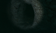 The fossil-surrounded entrance to Secret Cave.