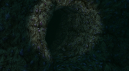 The stone-encrusted entrance to Crystal Cave.