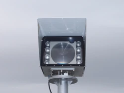 An 8-beam free space optics laser link, rated for 1 Gbit/s at a distance of approximately 2&nbsp;km. The receptor is the large disc in the middle, the transmitters the smaller ones. To the top and right corner a  for assisting the alignment of the two heads.