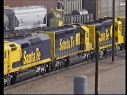 Atchison, Topeka & Santa Fe's only three Fairbanks-Morse Erie-Builts lead  lead train 101, the Centennial State, out of Denver with 7 cars at 30 MPH  in 1951. The poor reliability of the