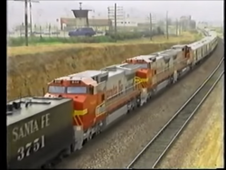 Atchison, Topeka & Santa Fe's only three Fairbanks-Morse Erie-Builts lead  lead train 101, the Centennial State, out of Denver with 7 cars at 30 MPH  in 1951. The poor reliability of the