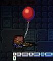 The player with the red balloon.