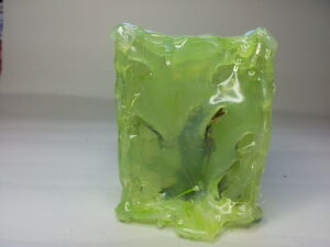 Gelatinous cube green with figure inside