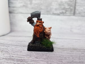 Dwarven male butcherer with pig