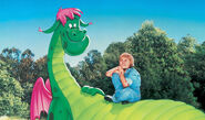 Elliott from the 1977 film Pete's Dragon. The float is based upon this character.