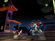 Mickey and a Tanker about to engage in a battle. There's also some platforms in the upper right. A green E-Ticket can be seen.