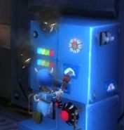 Gremlin Epsilon breaking a control panel to stop one of the two obstacles.