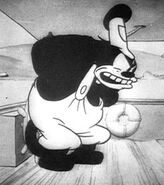 Pete as he appears in Mickey's debut cartoon, "Steamboat Willie"