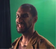 Neil Blan seen as a walker in the Behind the Scenes