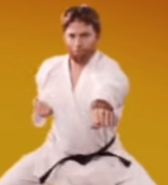 EpicLLOYD as Chuck Norris (martial arts outfit)
