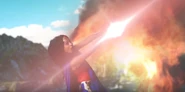Wonder Woman destroying a meteor with her bracelets