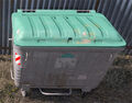 dumpster with closed lid