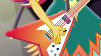 Sunset Shimmer strumming her rhythm guitar EG4