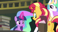 Twilight levitates sketch into Sunset's saddlebag EGFF