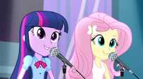 Twilight and Fluttershy start singing Shake Your Tail EG2