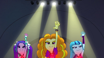 Dazzlings with their hands up EG2