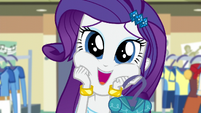 Rarity pushing her hands on her marshmallow cheeks.