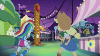 Rainbow and Applejack running to carnival games EG2