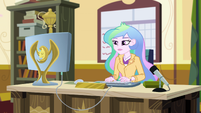 Principal Celestia working in her office EGHU