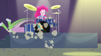 Fluttershy ducks behind Pinkie's drum platform EG2