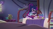 Twilight Sparkle reading a book in her bed EG4