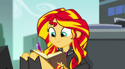 Sunset writing a friendship report to Princess Twilight EG2