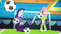 Rarity and Fluttershy showered with soccer balls EG2