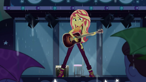 Sunset confidently playing the guitar EGDS49