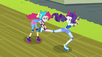 Pinkie Pie grabs Rarity's leg EG3