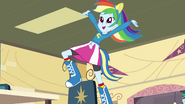 Rainbow Dash on top of a chair EG