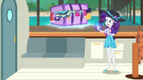 Rarity lifts her luggage onto the sailboat EGDS18