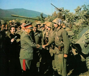 JNA (YPA) soldiers wearing the first pattern helmet cover