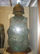 The lake Copais "Thracian type" helmet with a bronze cuirass. Markings of the helmet: "HIARON"[11] (at the British Museum)[12][13]