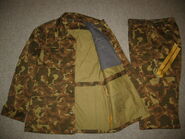 A brown ttsko camouflaged M88 suit manufactured in 1993[31]