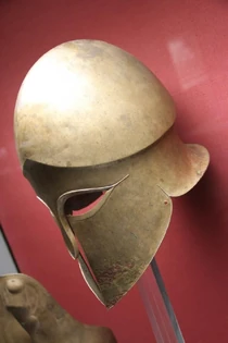 A Corinthian helmet found in the Denda tomb. From a Greek workshop in South Italy, 500–490 BC.[1][2]