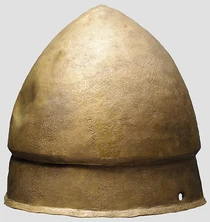 Early Pilos-type helmet dated to 5th/4th century BC[1]